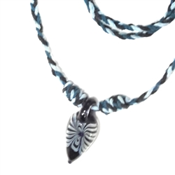 BLACK CORD NECKLACE WITH DROP PENDANT. 
&#8203;HAND BLOWN GLASS WITH ROUNDED BOTTOM.